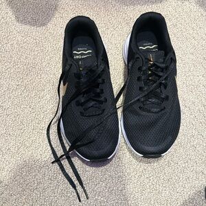Black and Gold Nike Sneakers